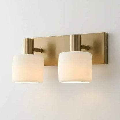 Aura Modern Brass Cylinder Porcelain Wall Sconce