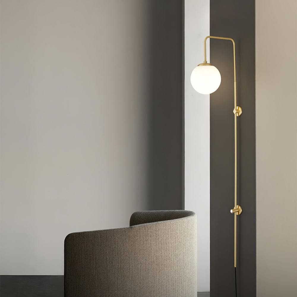 Qorven Minimalist Long Pole Globe Brass Plug In Wall Sconce