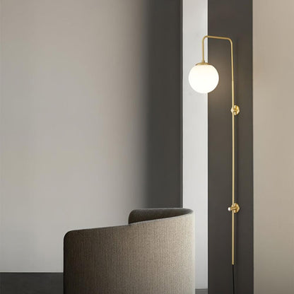 Qorven Minimalist Long Pole Globe Brass Plug In Wall Sconce