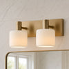 Aura Modern Brass Cylinder Porcelain Wall Sconce