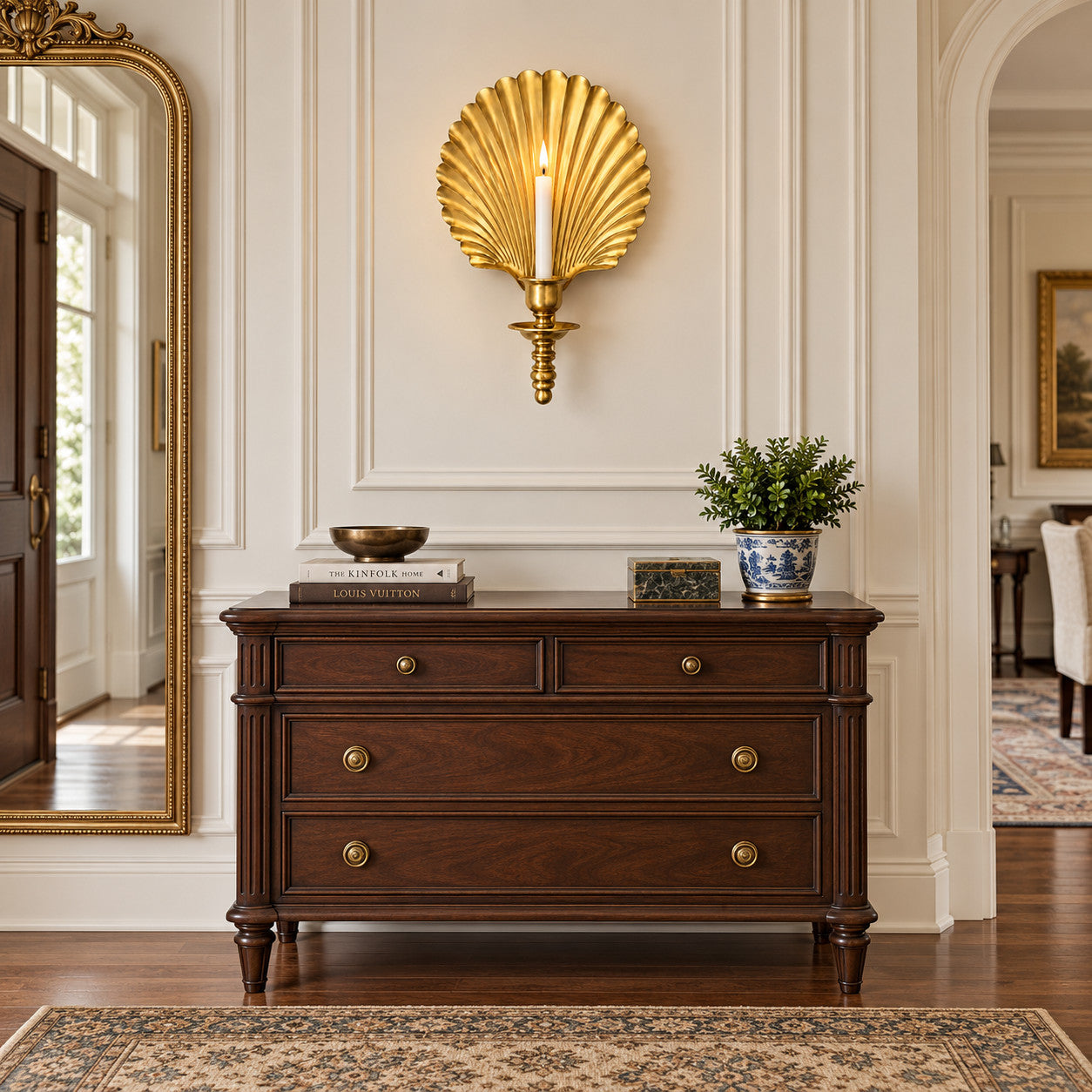Hallway with brass shell wall candlesticks