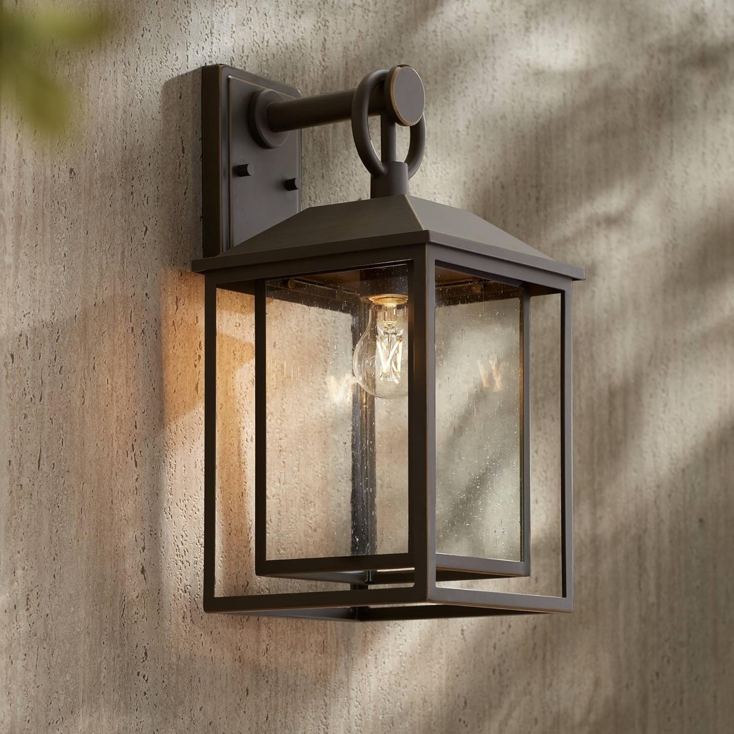 Mythor Bronze Textured Clear Glass Lantern Outdoor Sconce